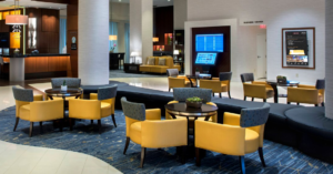 Digital readerboard and flight-board in lobby at BWI Airport Marriott